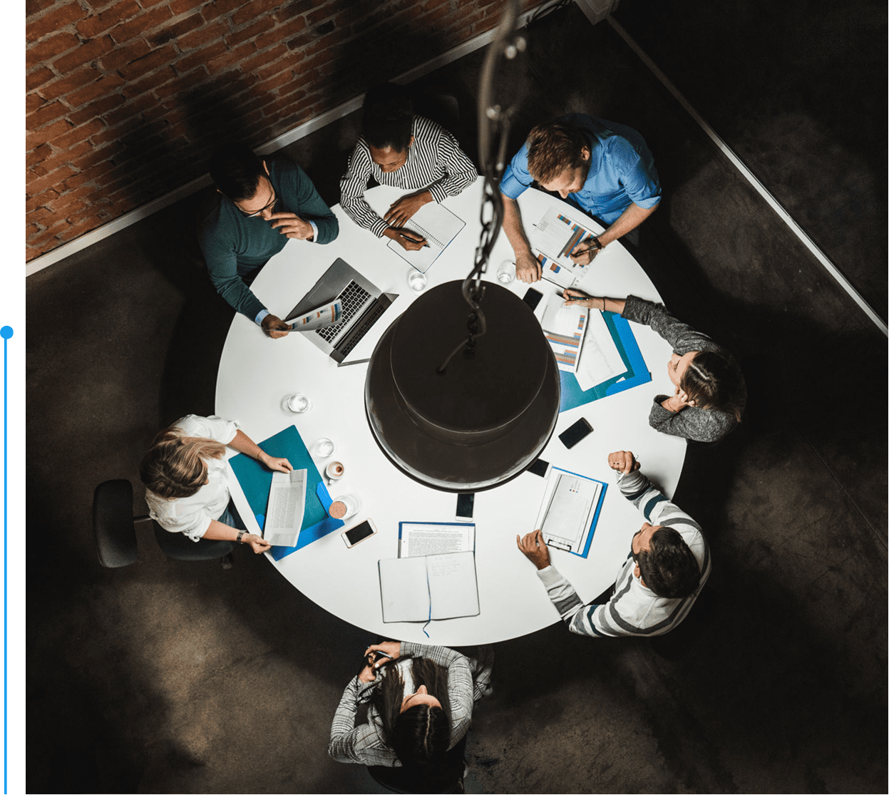 Overhead view of business discussion